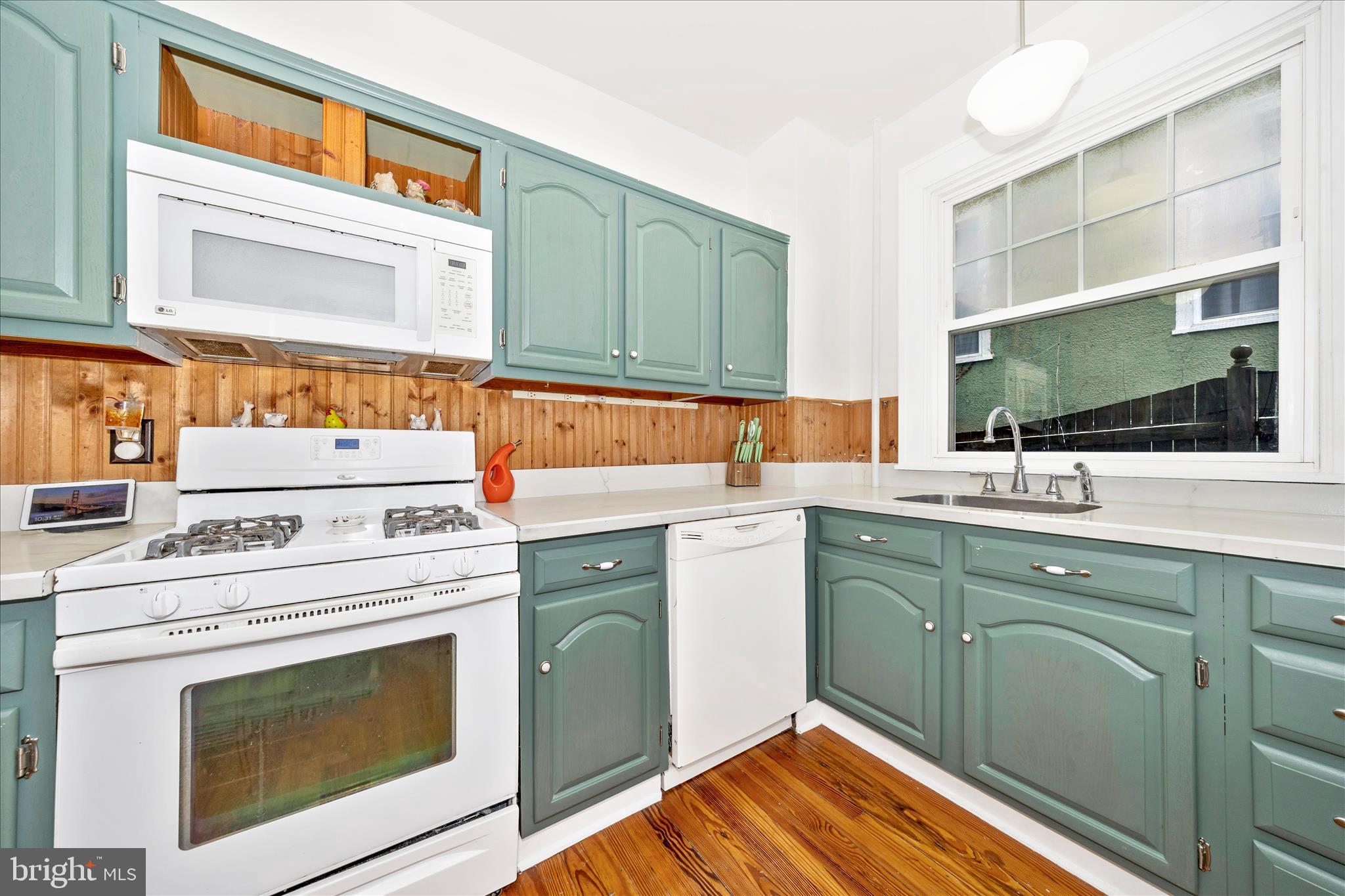 707 Summit Avenue Hagerstown, MD 21740 - Photo 16 of 54 a kitchen with a stove top oven sink and cabinets