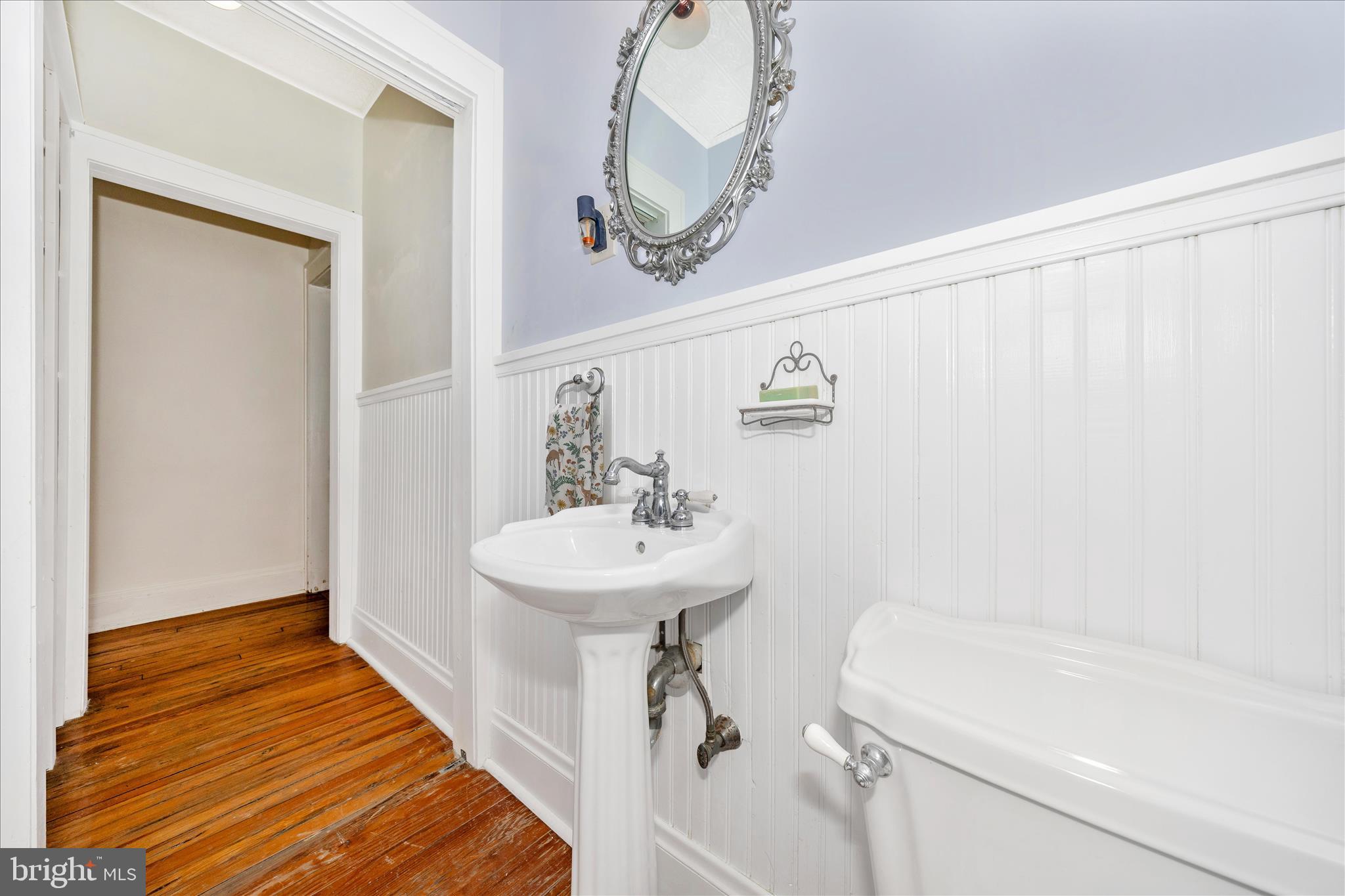 707 Summit Avenue Hagerstown, MD 21740 - Photo 20 of 54 a bathroom with a sink and a mirror