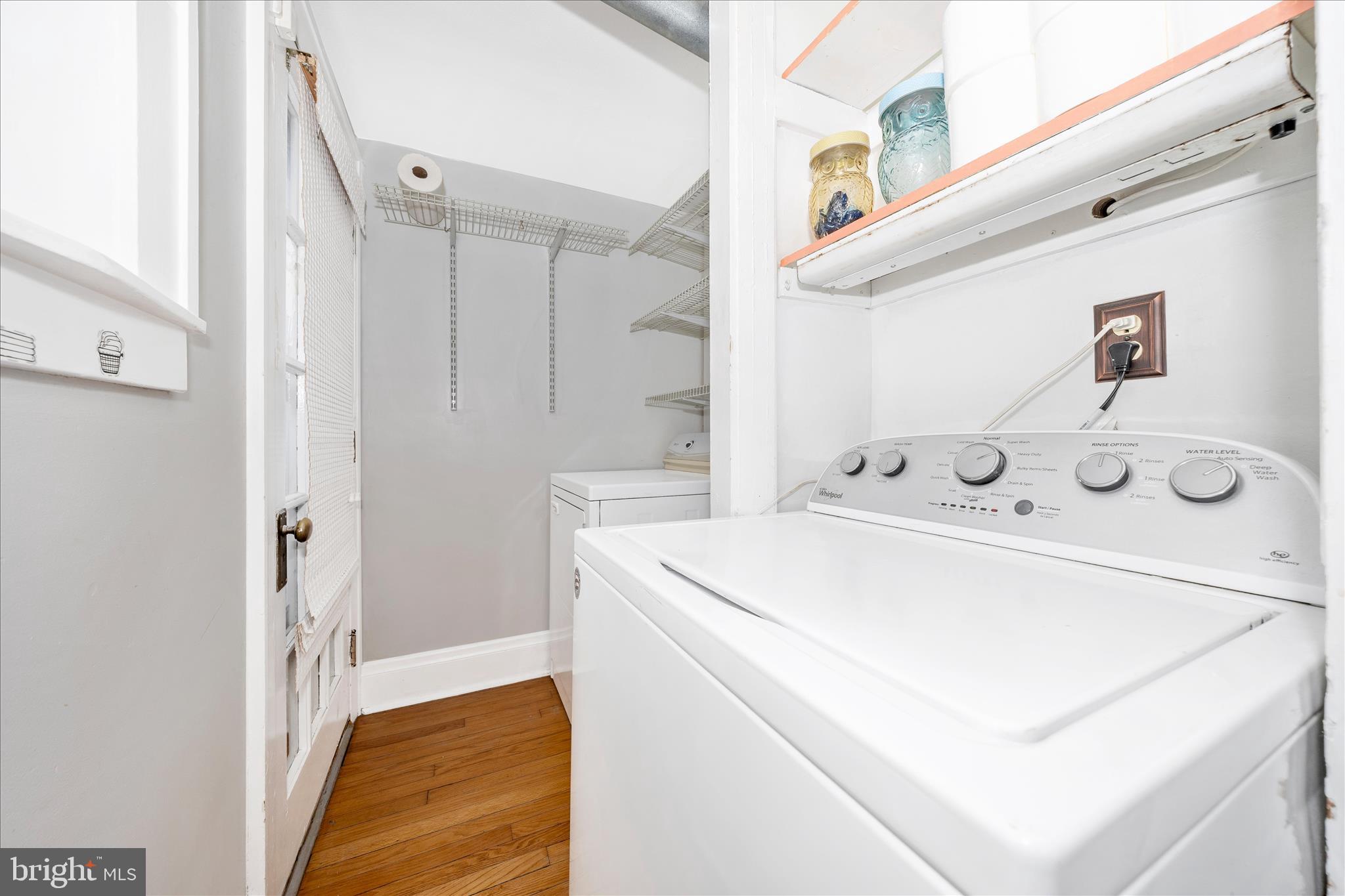 707 Summit Avenue Hagerstown, MD 21740 - Photo 22 of 54 a utility room with dryer and washer
