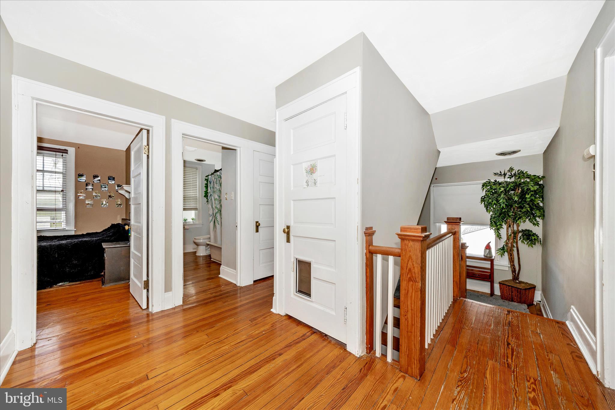 707 Summit Avenue Hagerstown, MD 21740 - Photo 23 of 54 a view of a hallway view with wooden floor and staircase