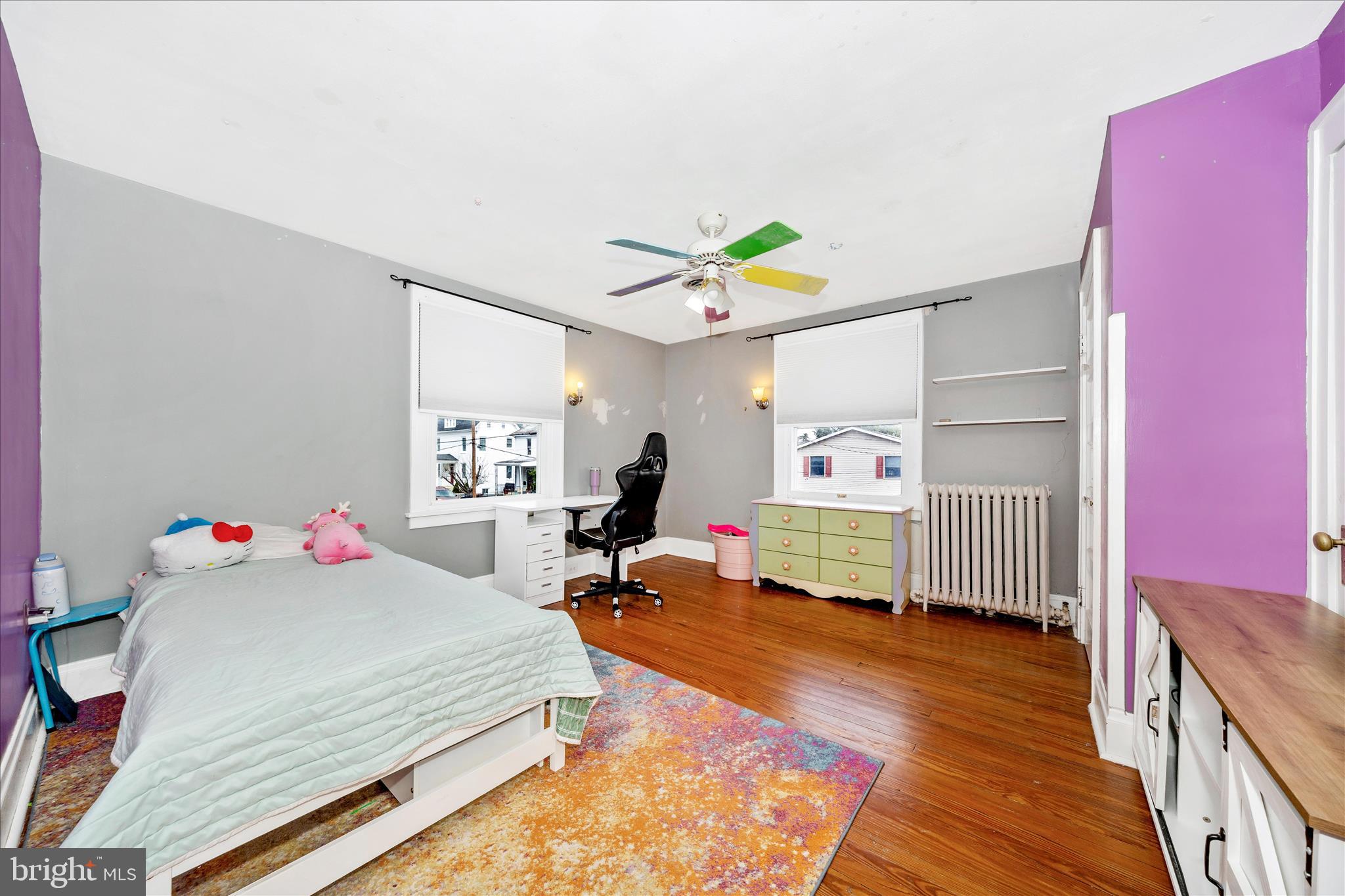 707 Summit Avenue Hagerstown, MD 21740 - Photo 24 of 54 a bedroom with a bed and wooden floor