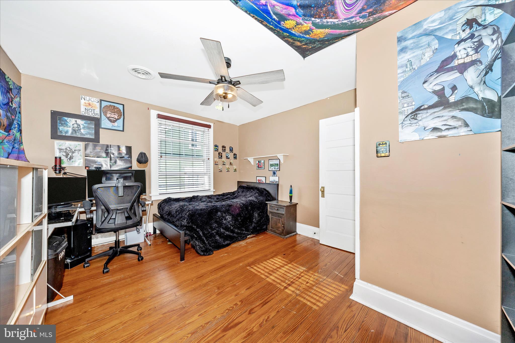 707 Summit Avenue Hagerstown, MD 21740 - Photo 32 of 54 a bedroom with a bed and wooden floor