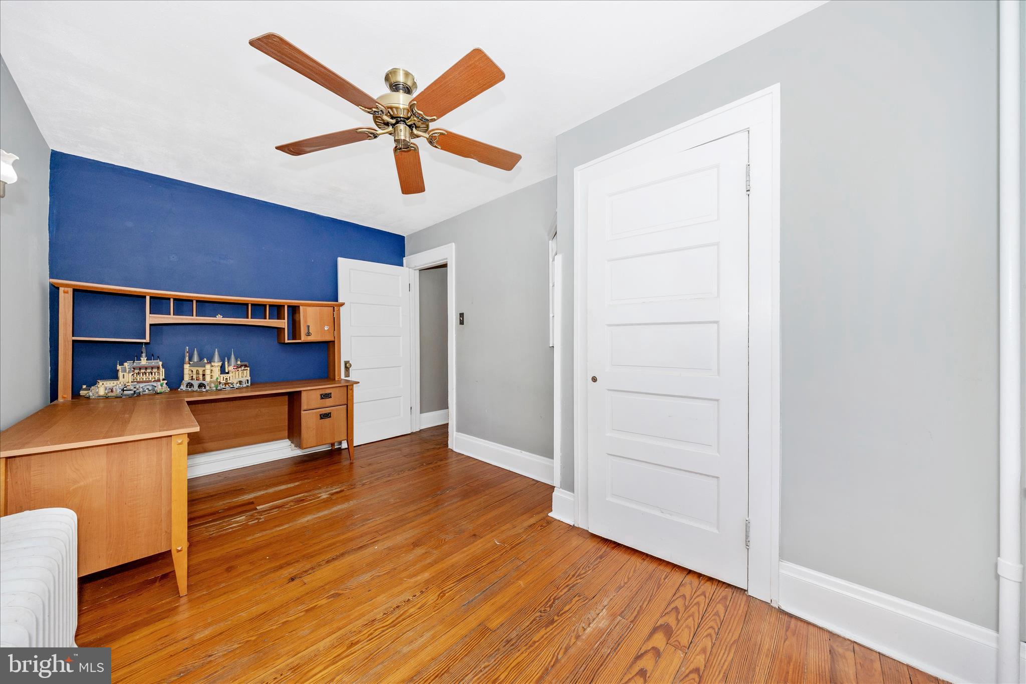 707 Summit Avenue Hagerstown, MD 21740 - Photo 35 of 54 a view of an empty room with a window and wooden floor