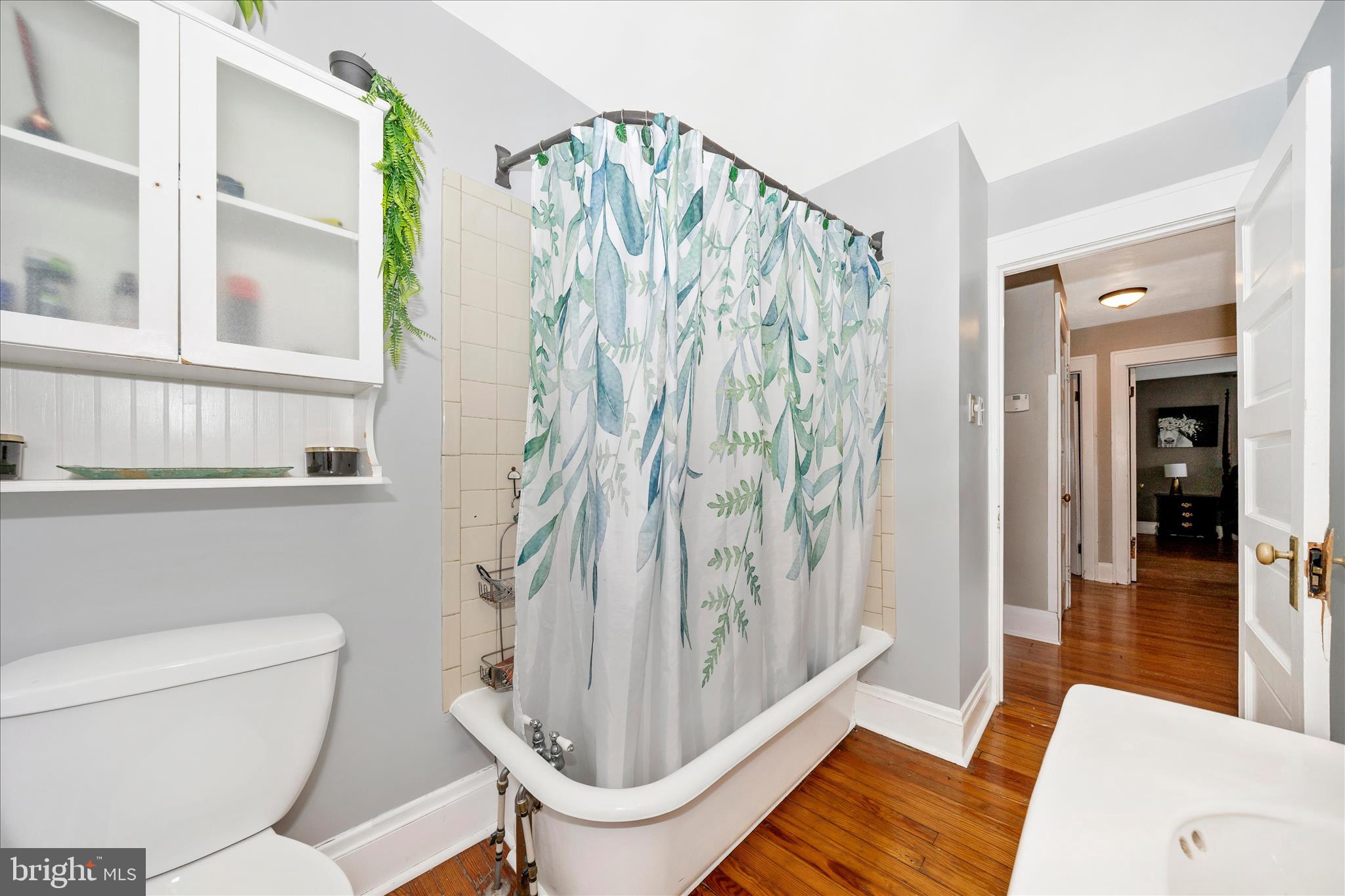 707 Summit Avenue Hagerstown, MD 21740 - Photo 39 of 54 a bathroom with a toilet and a shower
