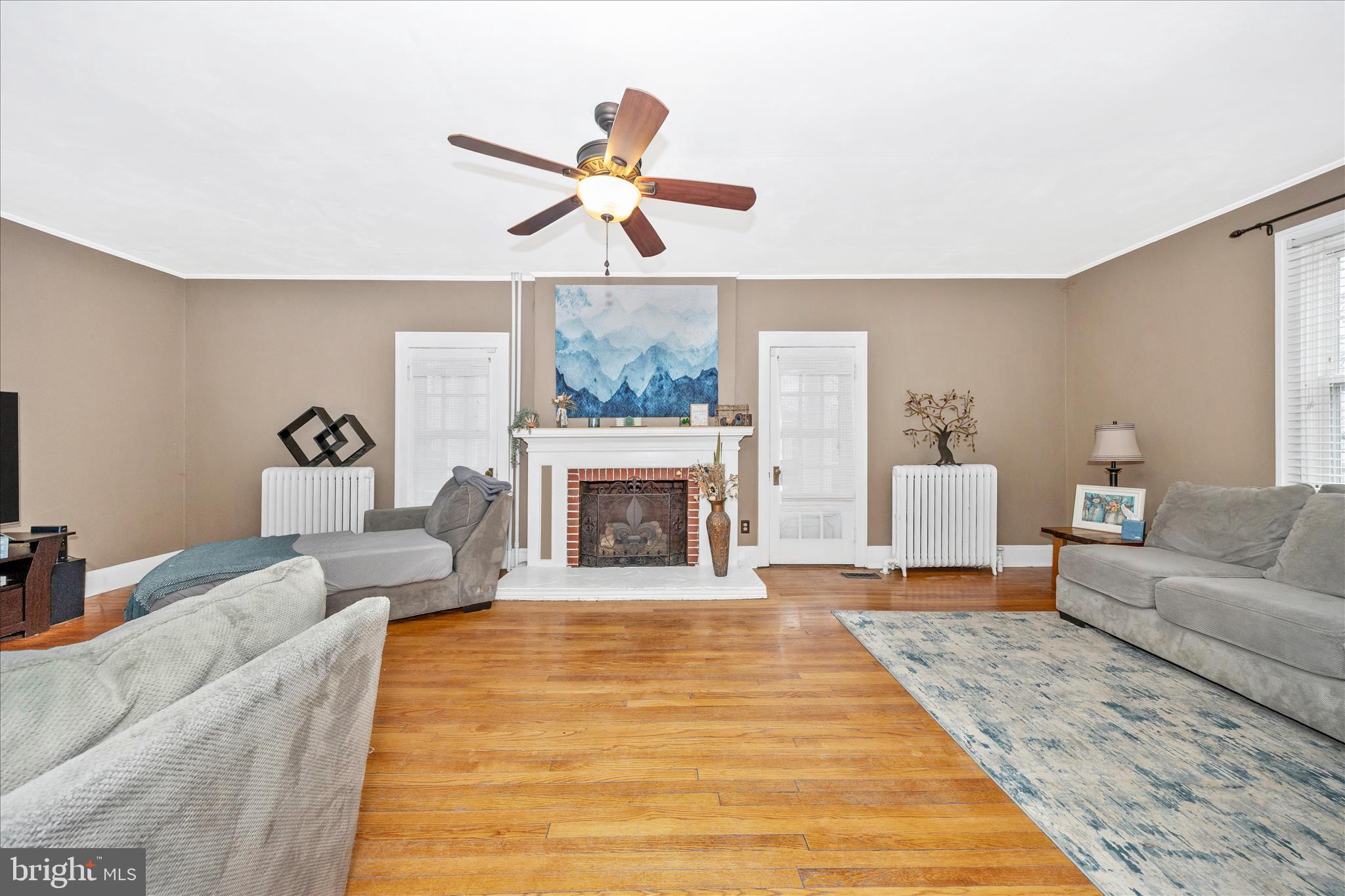 707 Summit Avenue Hagerstown, MD 21740 - Photo 4 of 54 a living room with furniture and a fireplace