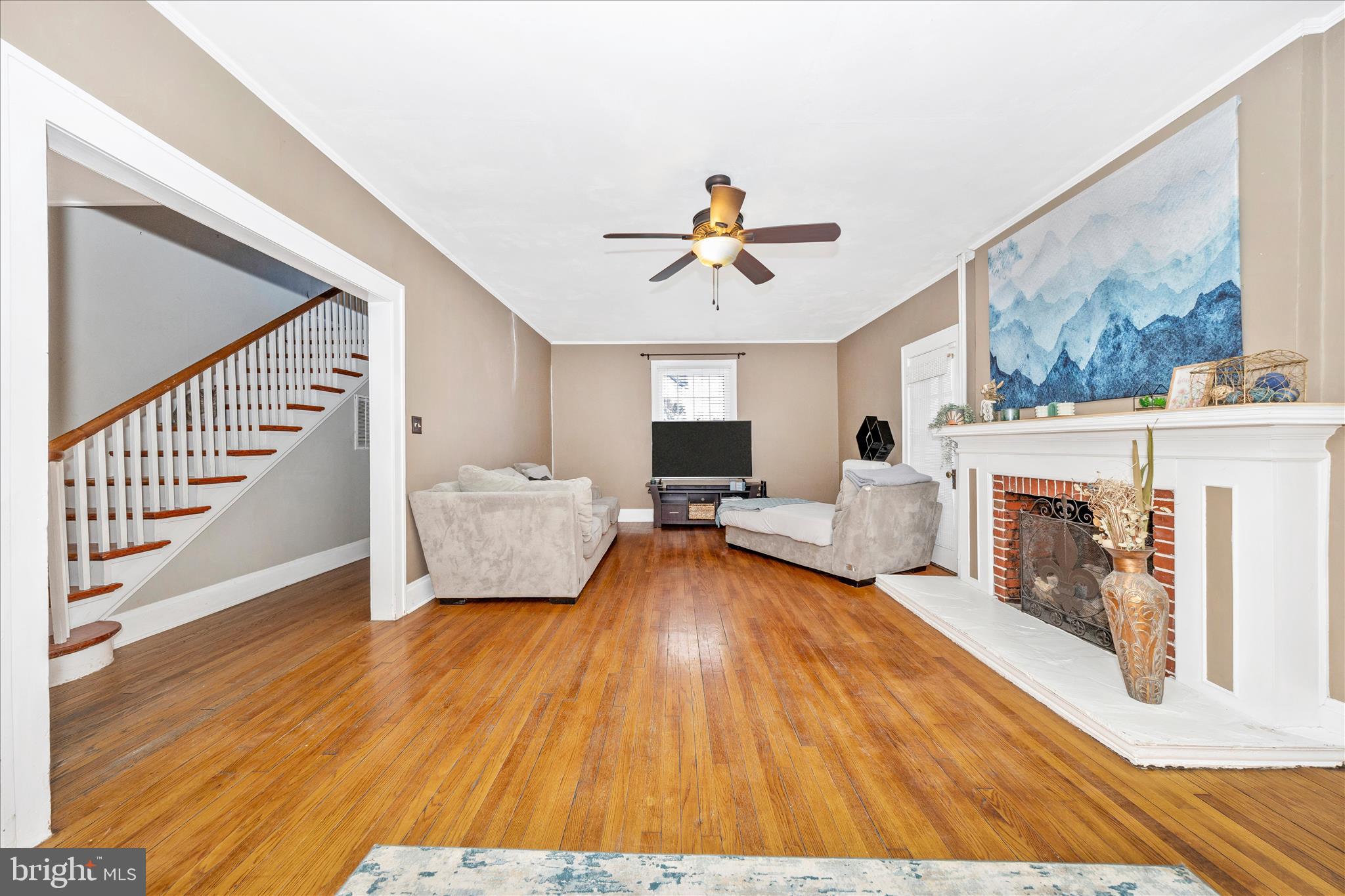 707 Summit Avenue Hagerstown, MD 21740 - Photo 6 of 54 a living room with furniture and a fireplace