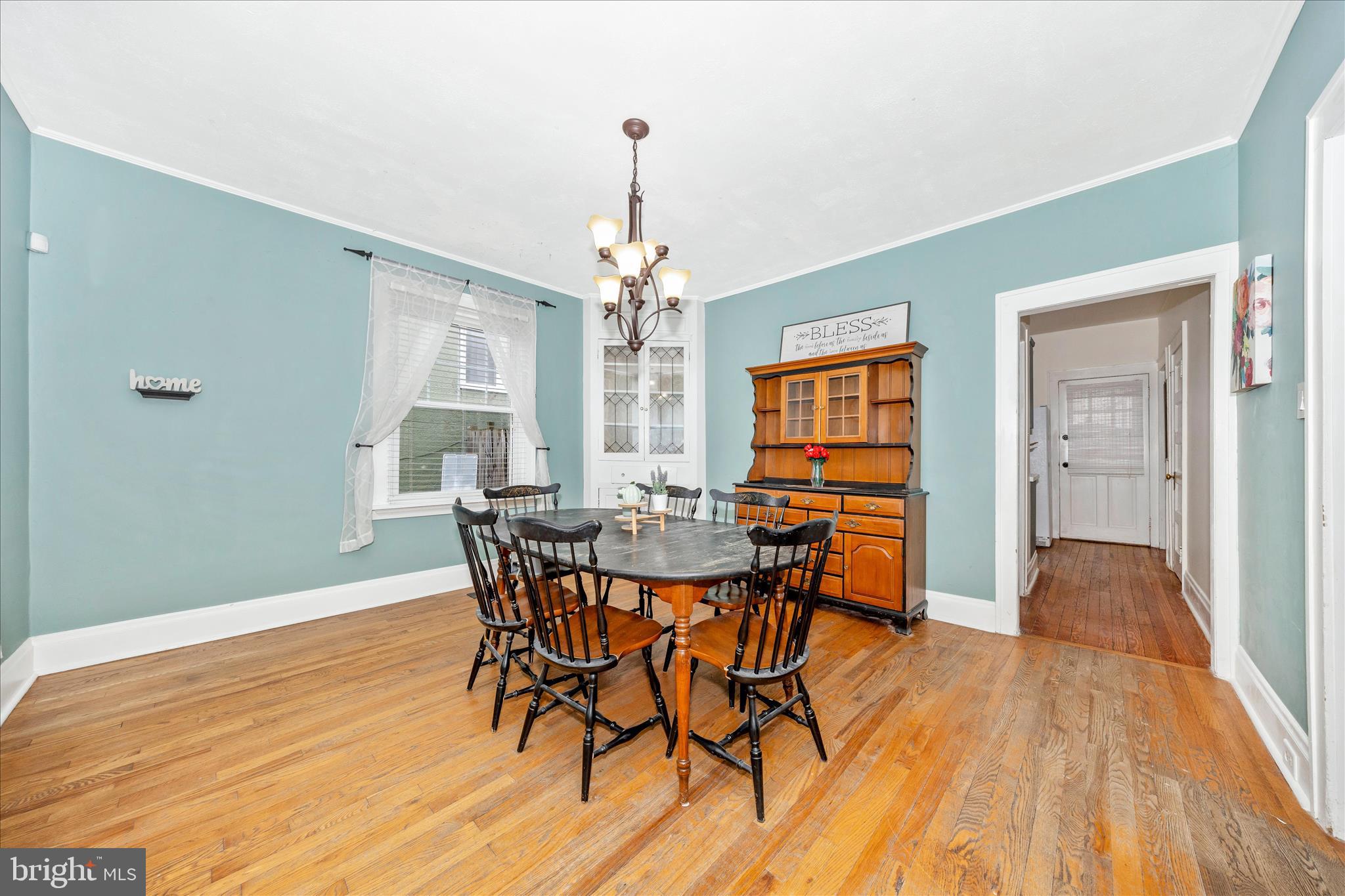707 Summit Avenue Hagerstown, MD 21740 - Photo 10 of 54 a view of a dining room with furniture window and wooden floor