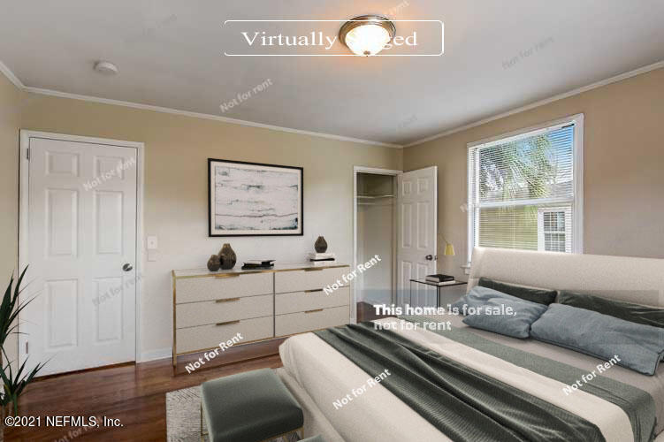 4611 Pinewood Road Jacksonville, FL 32210 - Photo 3 of 21 a bedroom with furniture and windows