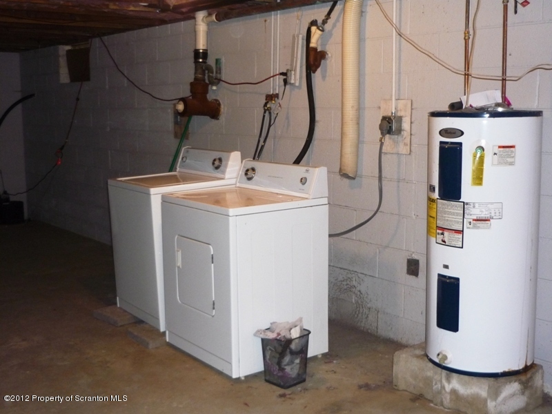 891 St Rt 502 Spring Brook Moscow, PA 18444 - Photo 20 of 41 a utility room with dryer and washer