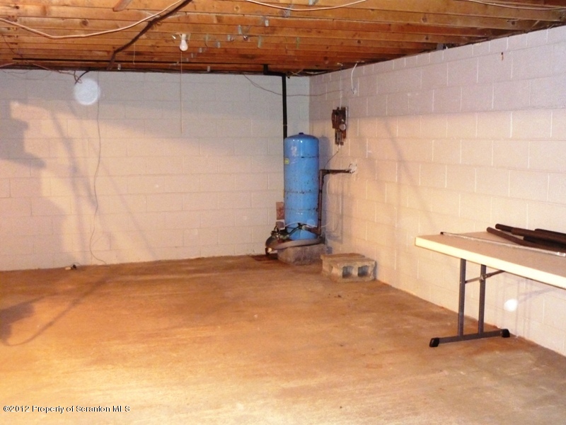 891 St Rt 502 Spring Brook Moscow, PA 18444 - Photo 21 of 41 a view of a room with gym equipment