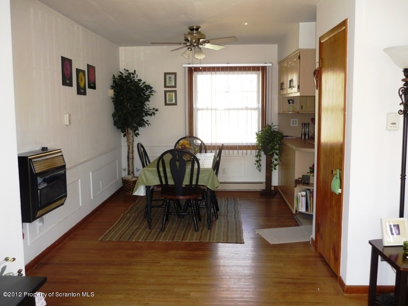 891 St Rt 502 Spring Brook Moscow, PA 18444 - Photo 3 of 41 a view of a livingroom with furniture and a window