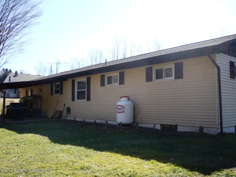 891 St Rt 502 Spring Brook Moscow, PA 18444 - Photo 37 of 41 a view of a house with backyard