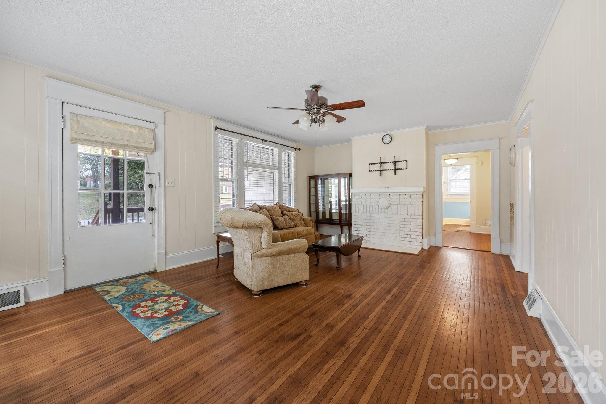 628 West Council Street Salisbury, NC 28144 - Photo 19 of 43 a living room with furniture and a table