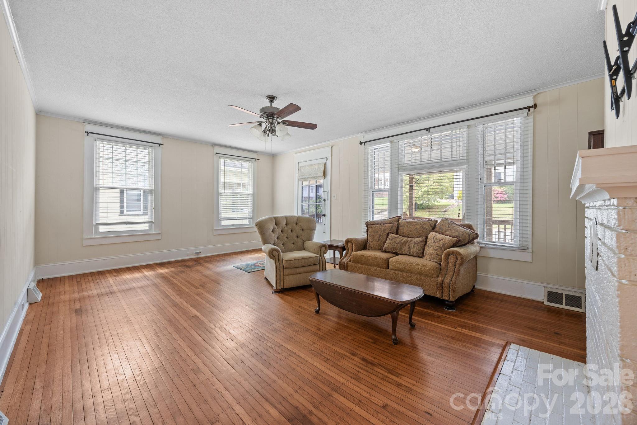 628 West Council Street Salisbury, NC 28144 - Photo 20 of 43 a living room with furniture and a window