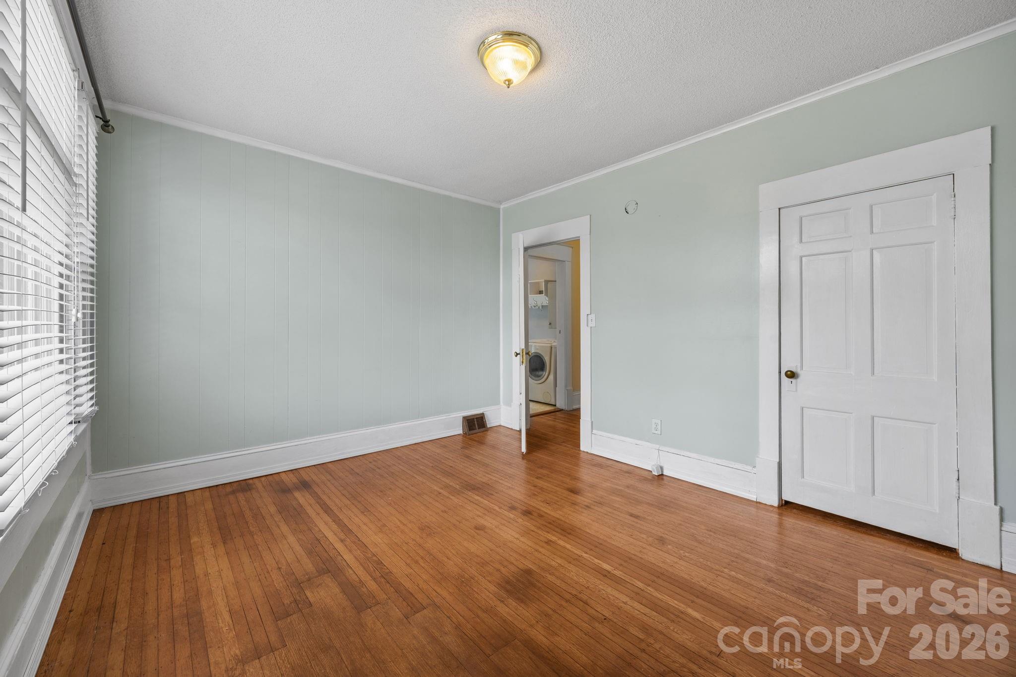 628 West Council Street Salisbury, NC 28144 - Photo 31 of 43 wooden floor in an empty room with a window