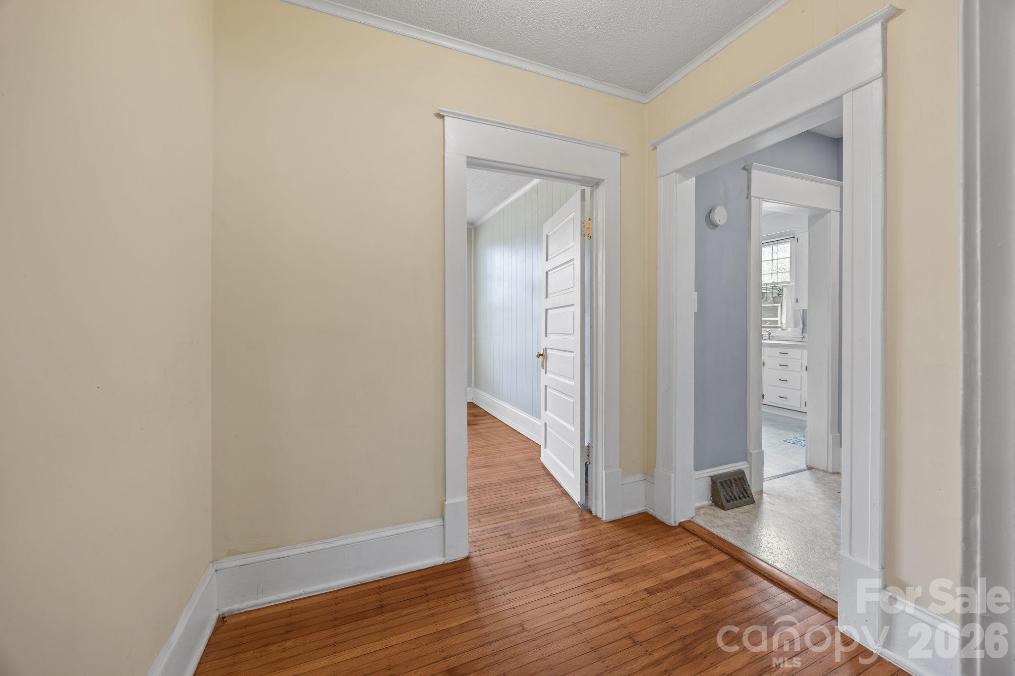 628 West Council Street Salisbury, NC 28144 - Photo 33 of 43 a view of a hallway with wooden floor and closet