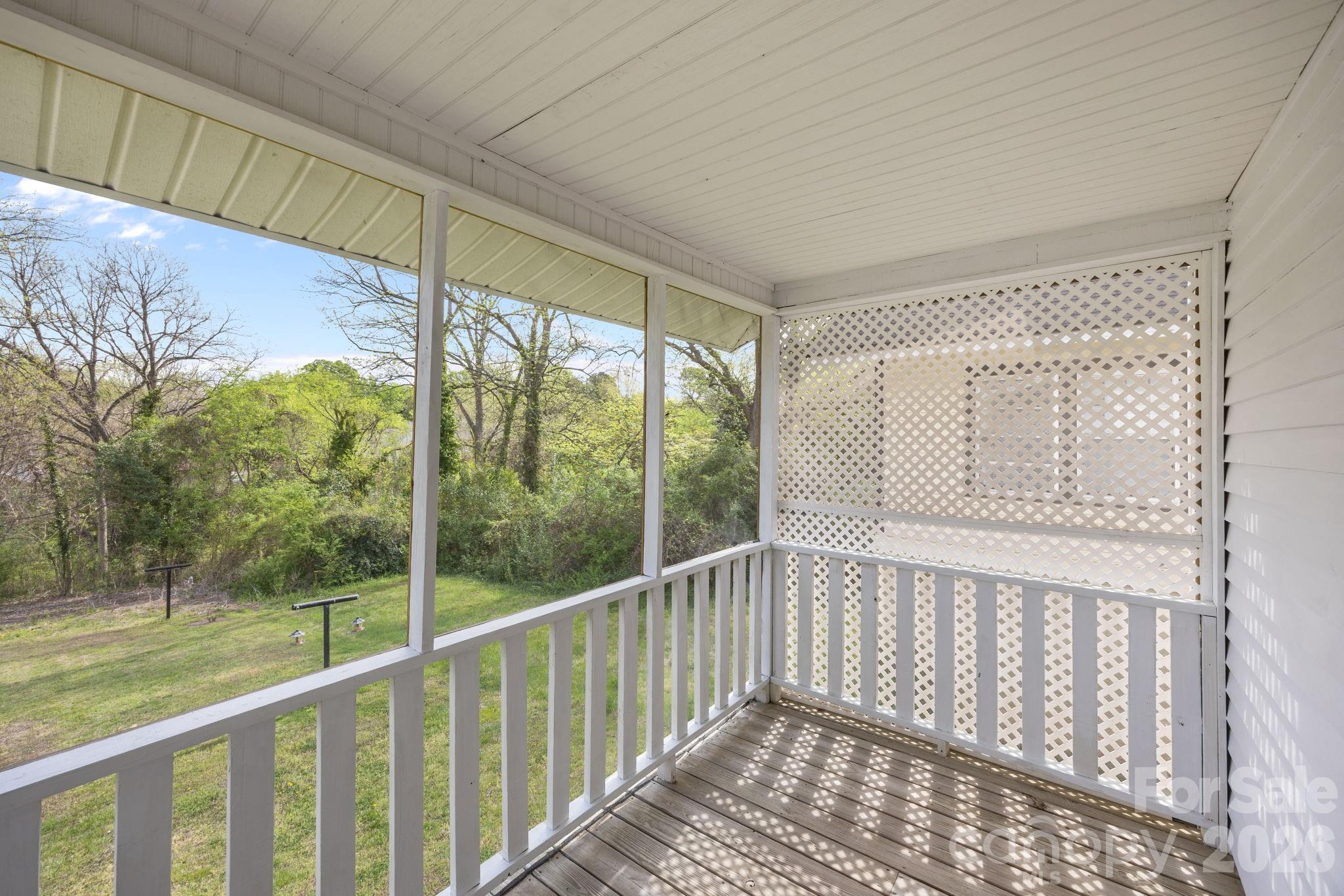 628 West Council Street Salisbury, NC 28144 - Photo 8 of 43 a view of a balcony with wooden floor