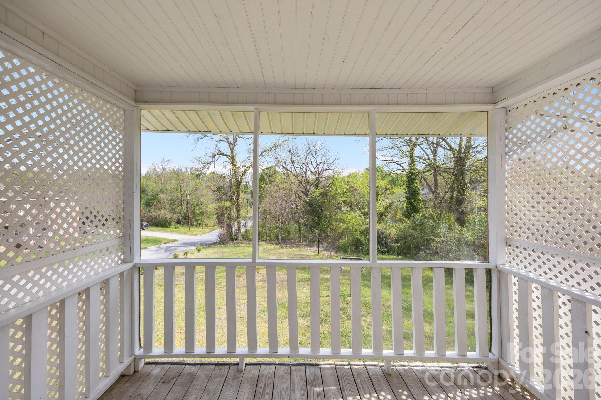 628 West Council Street Salisbury, NC 28144 - Photo 9 of 43 a view of a glass door with a yard