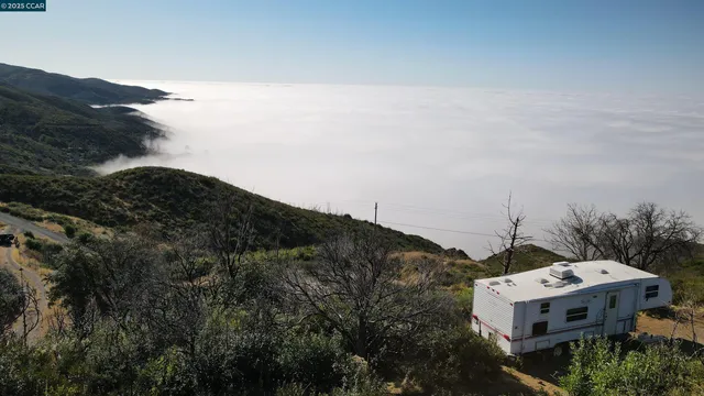 a view of a house with a mountain