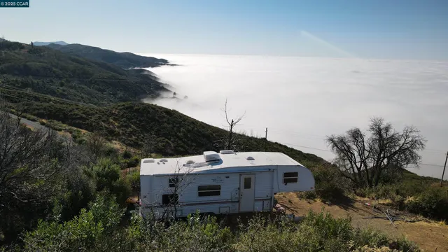 a view of a houses with a yard