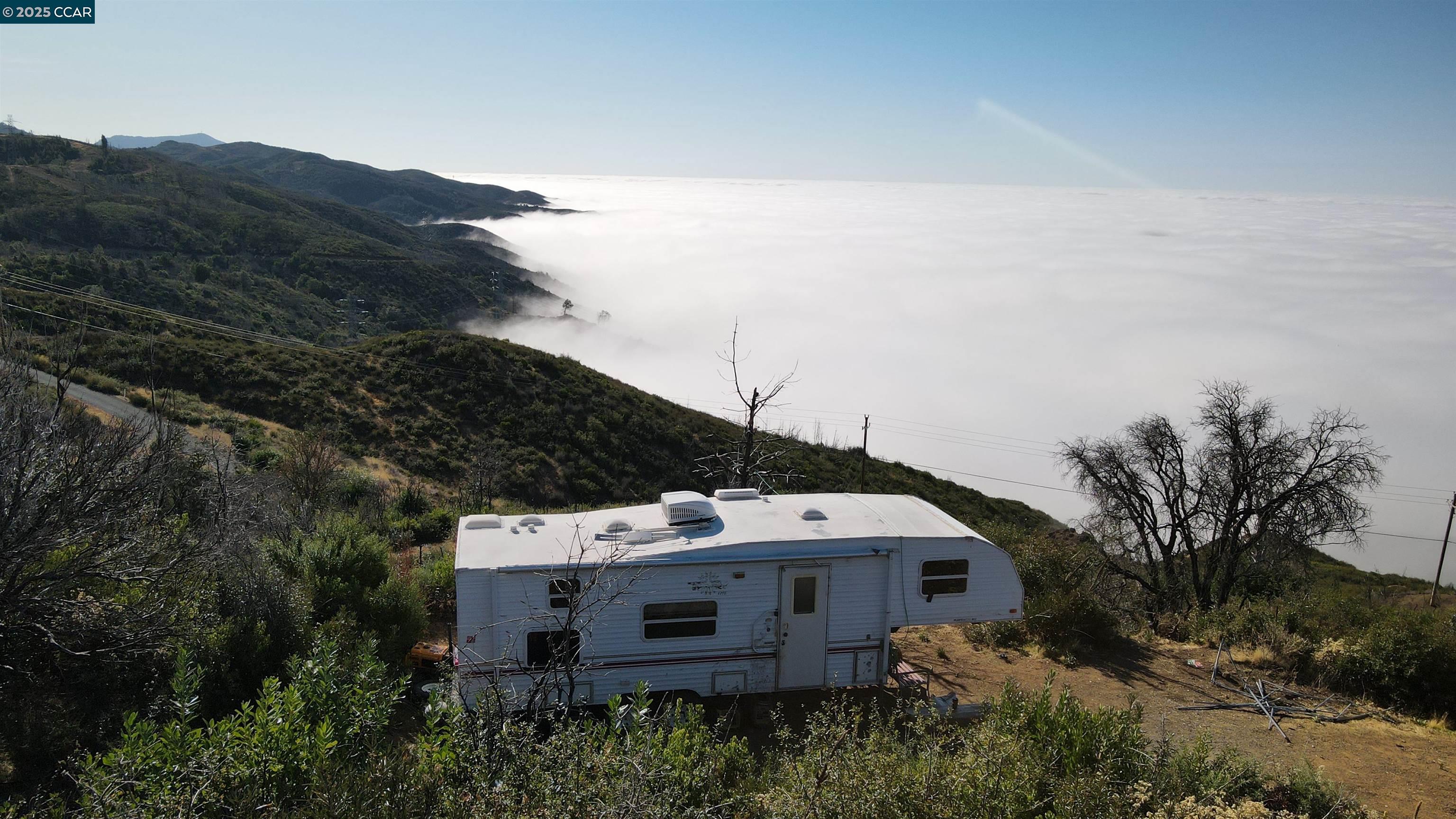 12700 Pine Flat Road Cloverdale, CA 95425 - Photo 17 of 20 a view of a house with a mountain