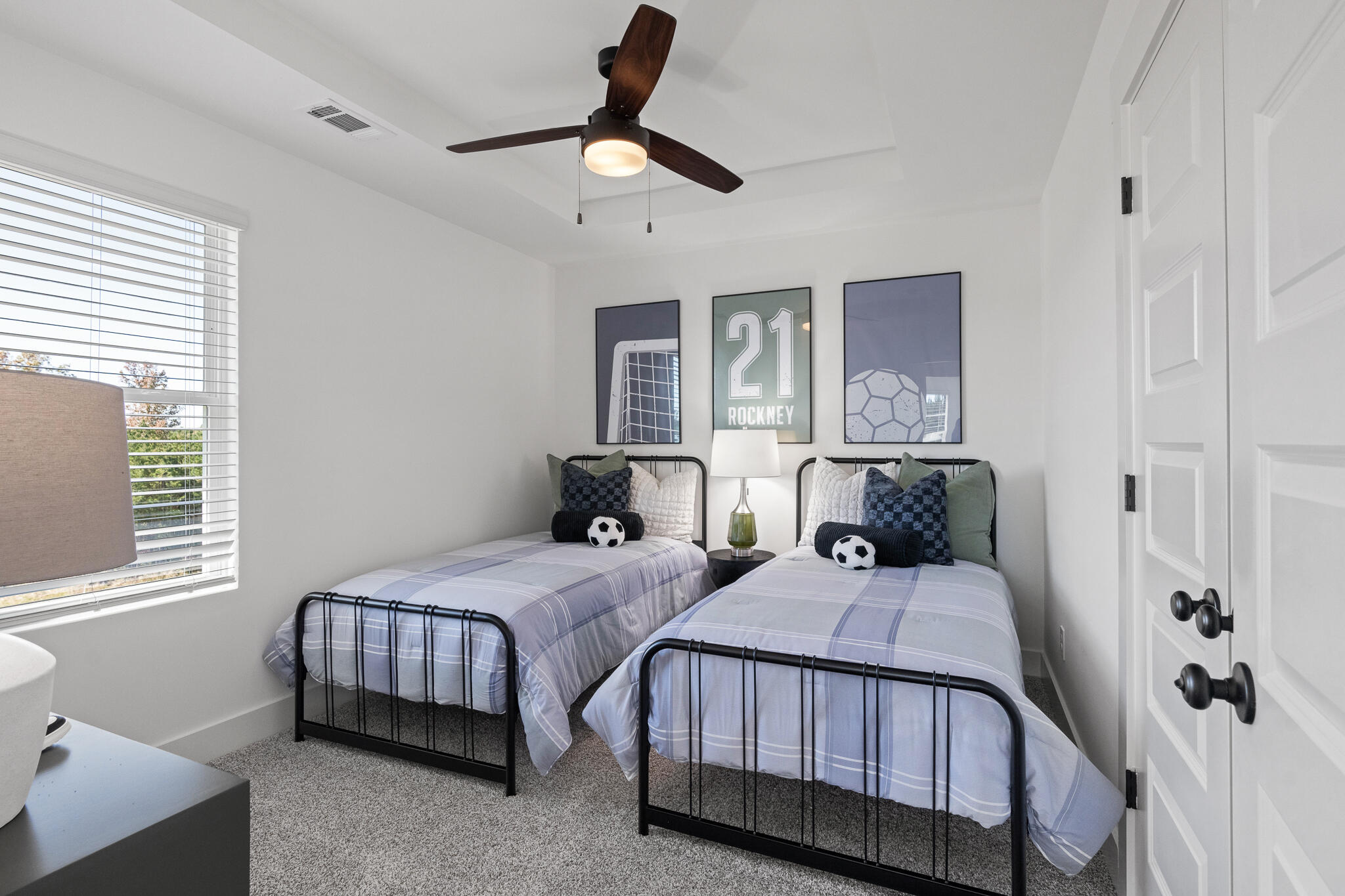 579 Bluebeech Street Freeport, FL 32439 - Photo 13 of 31 a bedroom with a bed a window and dresser