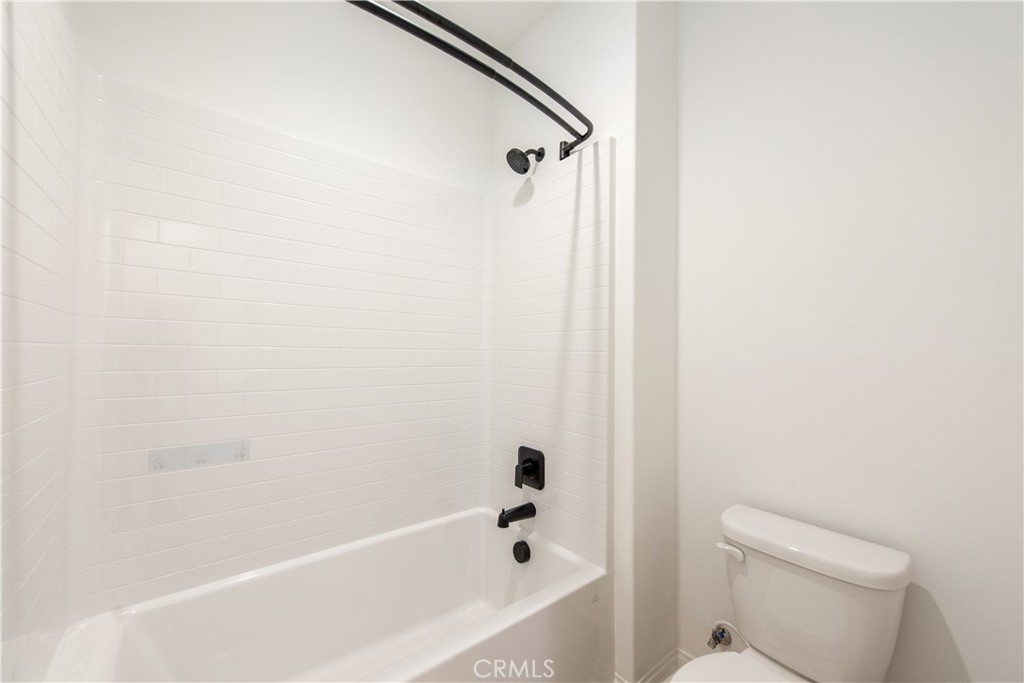 781 Cornelia Way Rancho Mission Viejo, CA 92694 - Photo 18 of 24 a bathroom with a bathtub and shower