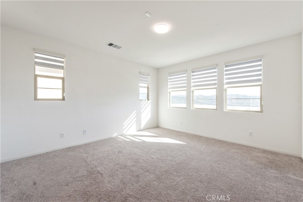 781 Cornelia Way Rancho Mission Viejo, CA 92694 - Photo 20 of 24 a view of an empty room with a window
