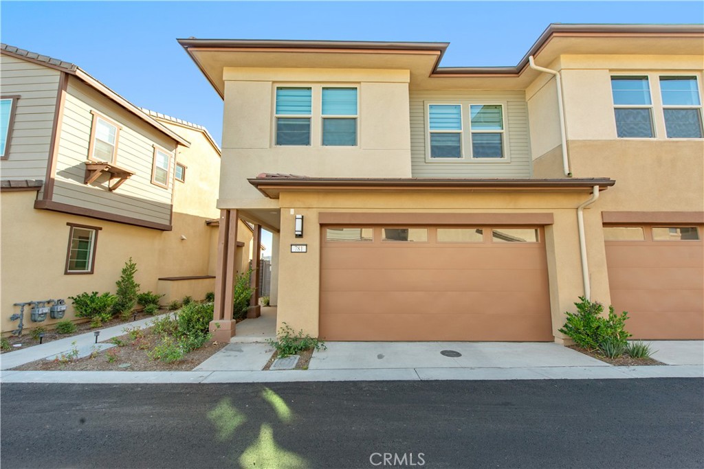 781 Cornelia Way Rancho Mission Viejo, CA 92694 - Photo 2 of 24 a front view of a building