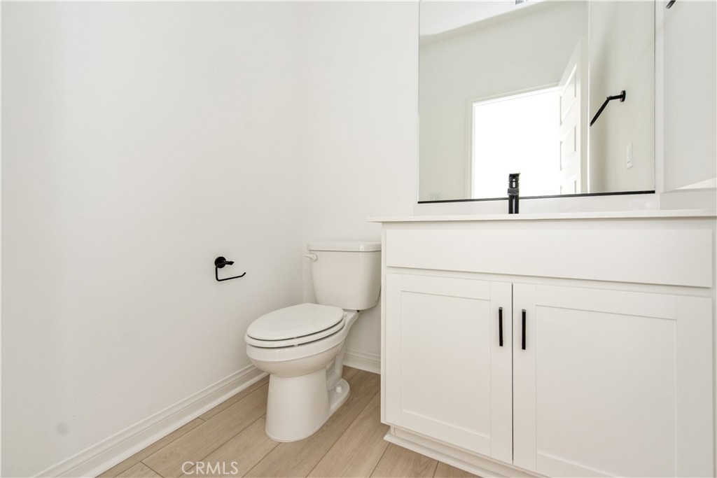 781 Cornelia Way Rancho Mission Viejo, CA 92694 - Photo 4 of 24 a bathroom with a toilet and a sink