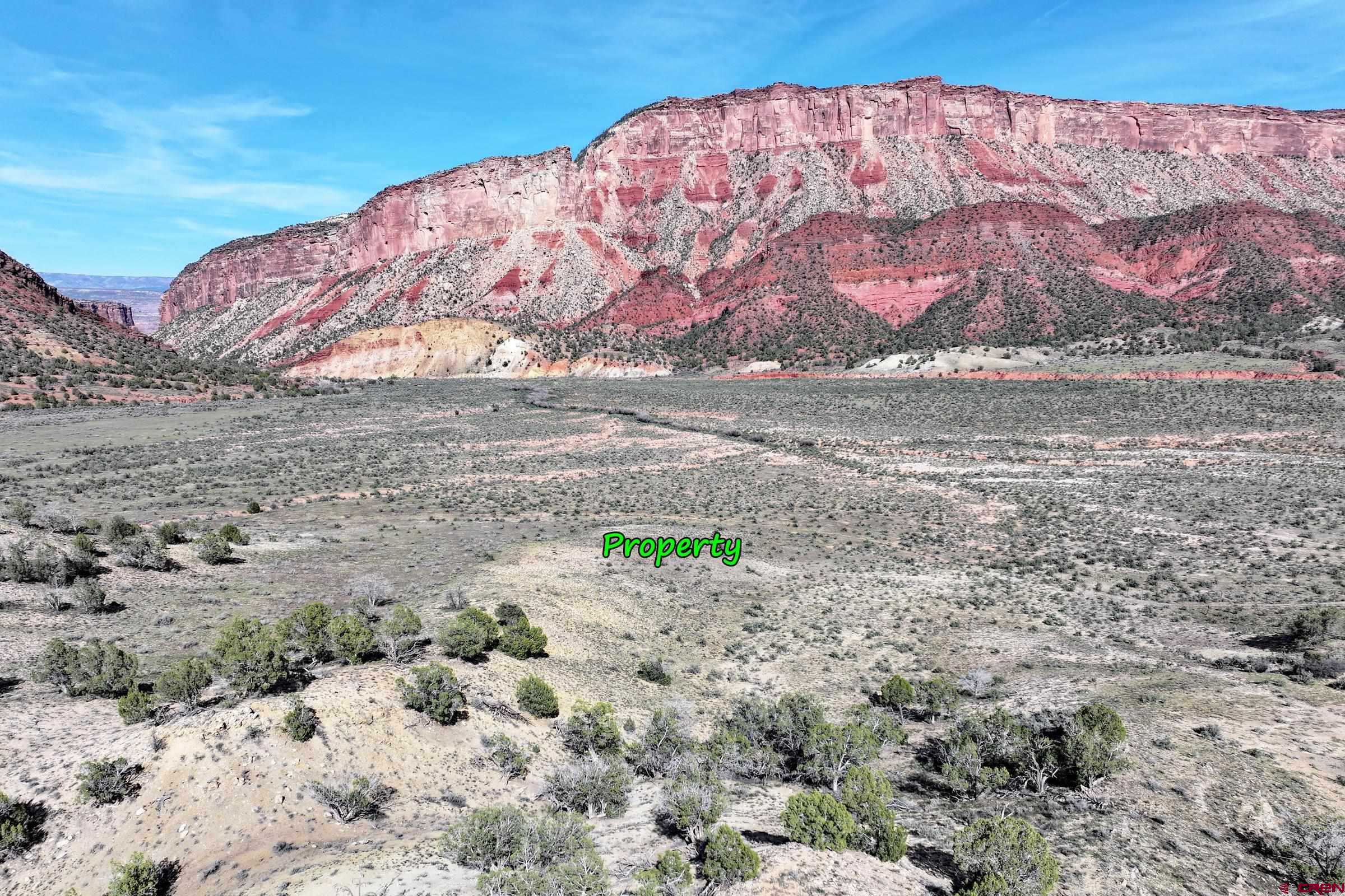 Tbd Tbd Tbd Gateway Paradox, CO 81429 - Photo 13 of 34 a view of a large body of water with a building in the background