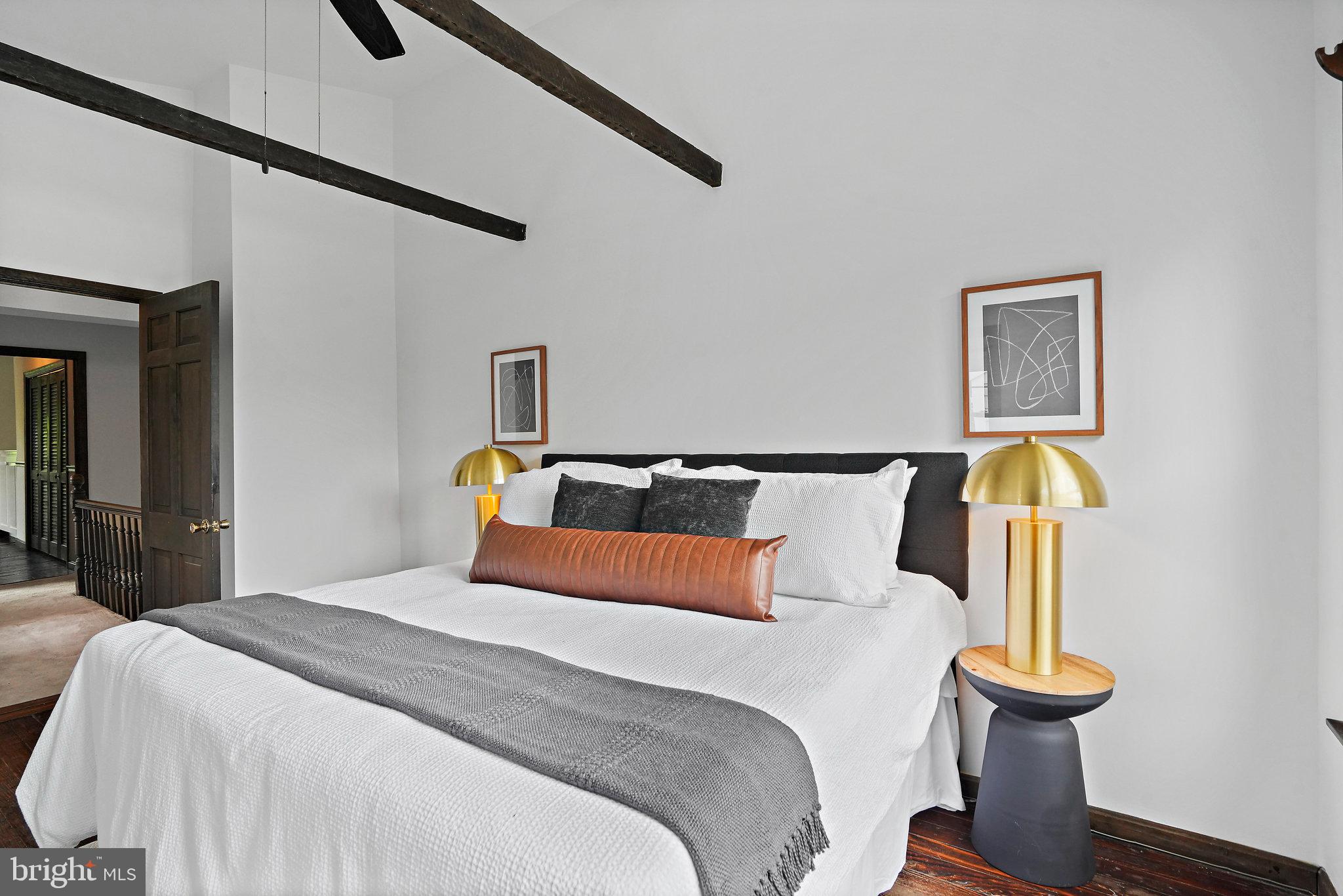 516 9th Street Southeast Washington, DC 20003 - Photo 18 of 35 King bed, 2 tables and plenty of space to spare