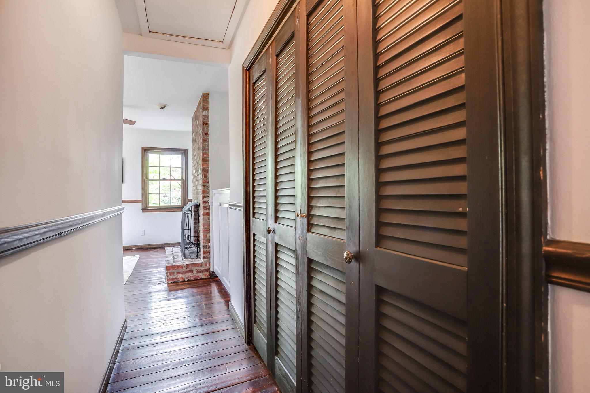 516 9th Street Southeast Washington, DC 20003 - Photo 27 of 35 Long wall of closets at entrance to front BR