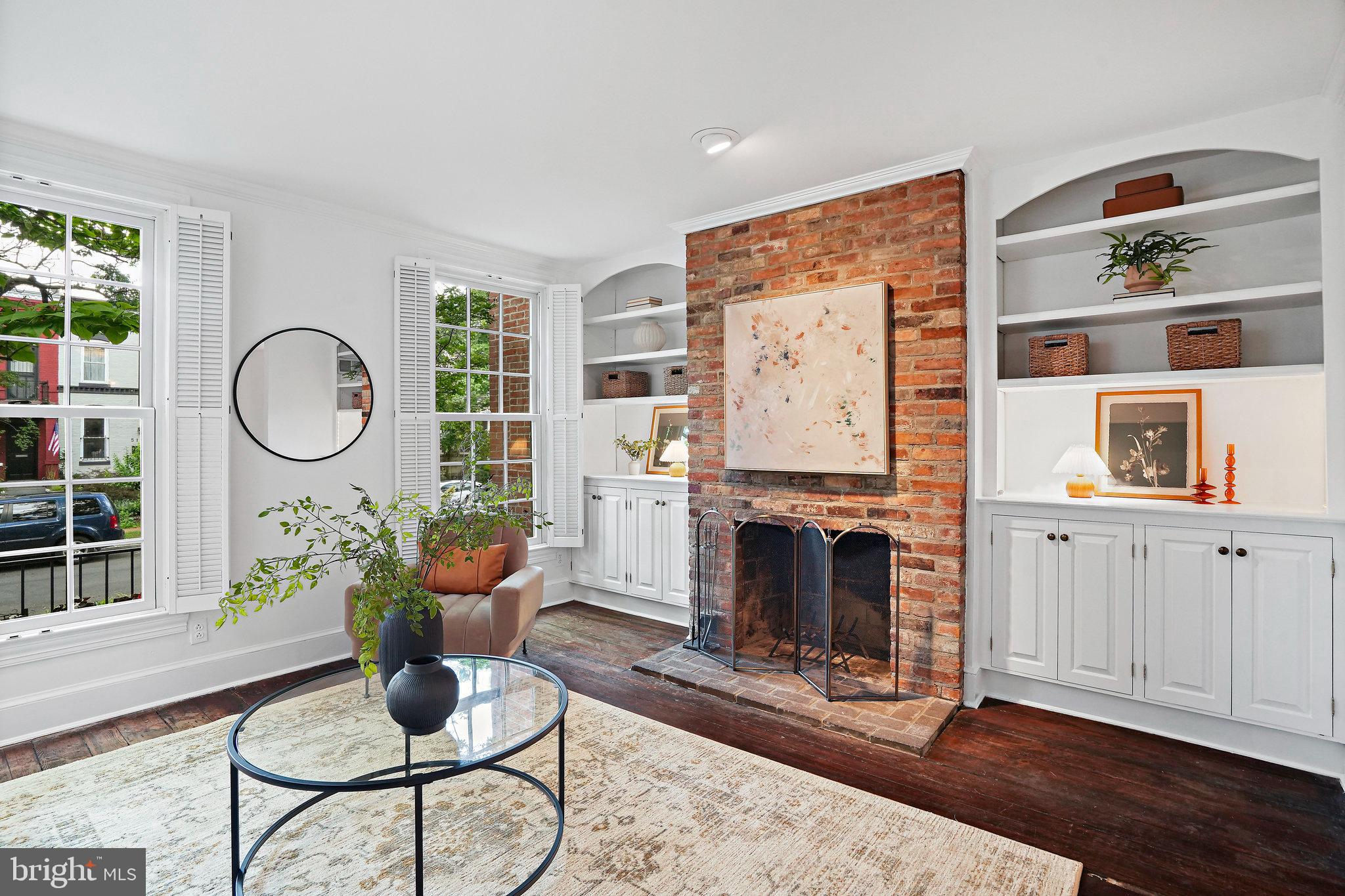 516 9th Street Southeast Washington, DC 20003 - Photo 4 of 35 Double bookcases flank FP (1 of 3 in this home)