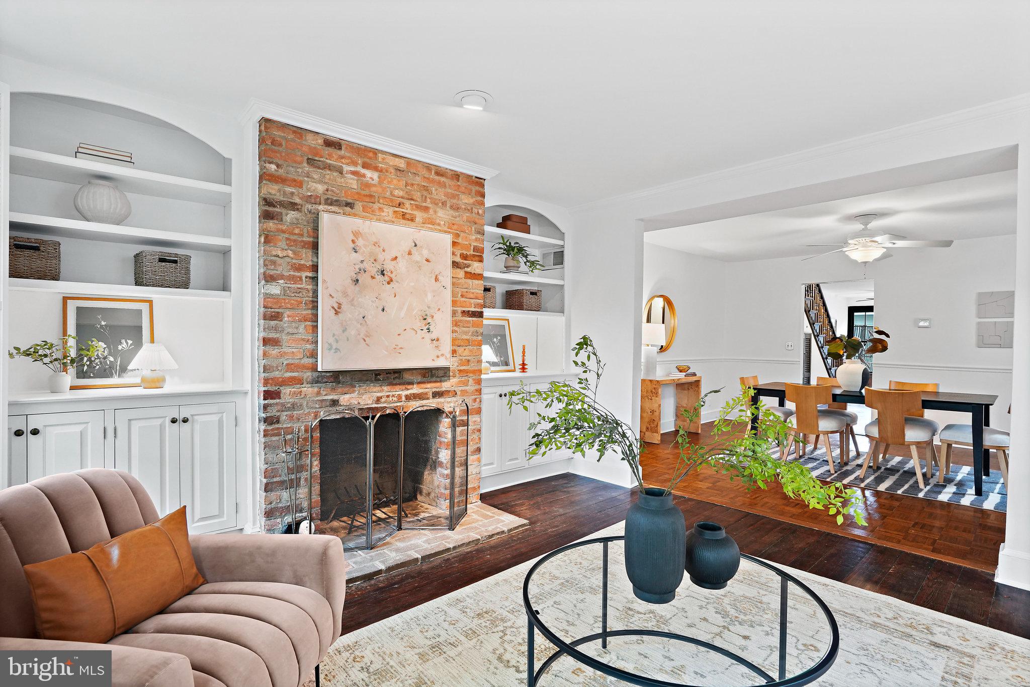 516 9th Street Southeast Washington, DC 20003 - Photo 5 of 35 LR w/lighted bookcases opens to large DR