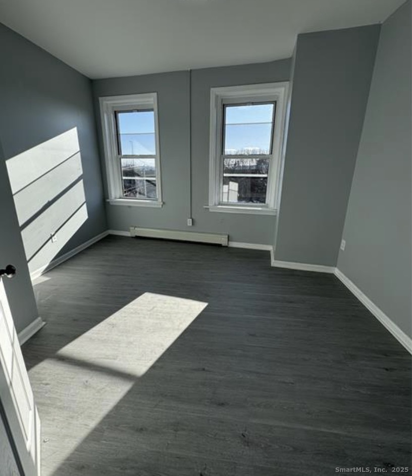 503 East Main Street Bridgeport, CT 06608 - Photo 7 of 7 an empty room with windows