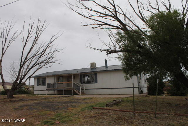 895 South Tanner Lane Snowflake, AZ 85937 - Photo 1 of 32 a view of a house with a large tree