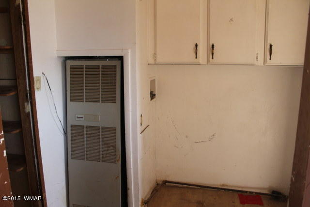 895 South Tanner Lane Snowflake, AZ 85937 - Photo 22 of 32 a view of small space with wooden floor and cabinets