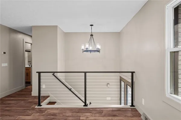 a view of entryway with wooden floor