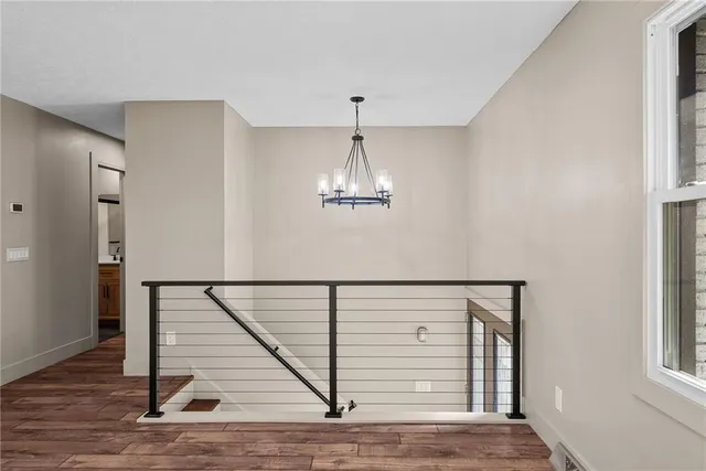 a view of entryway with wooden floor