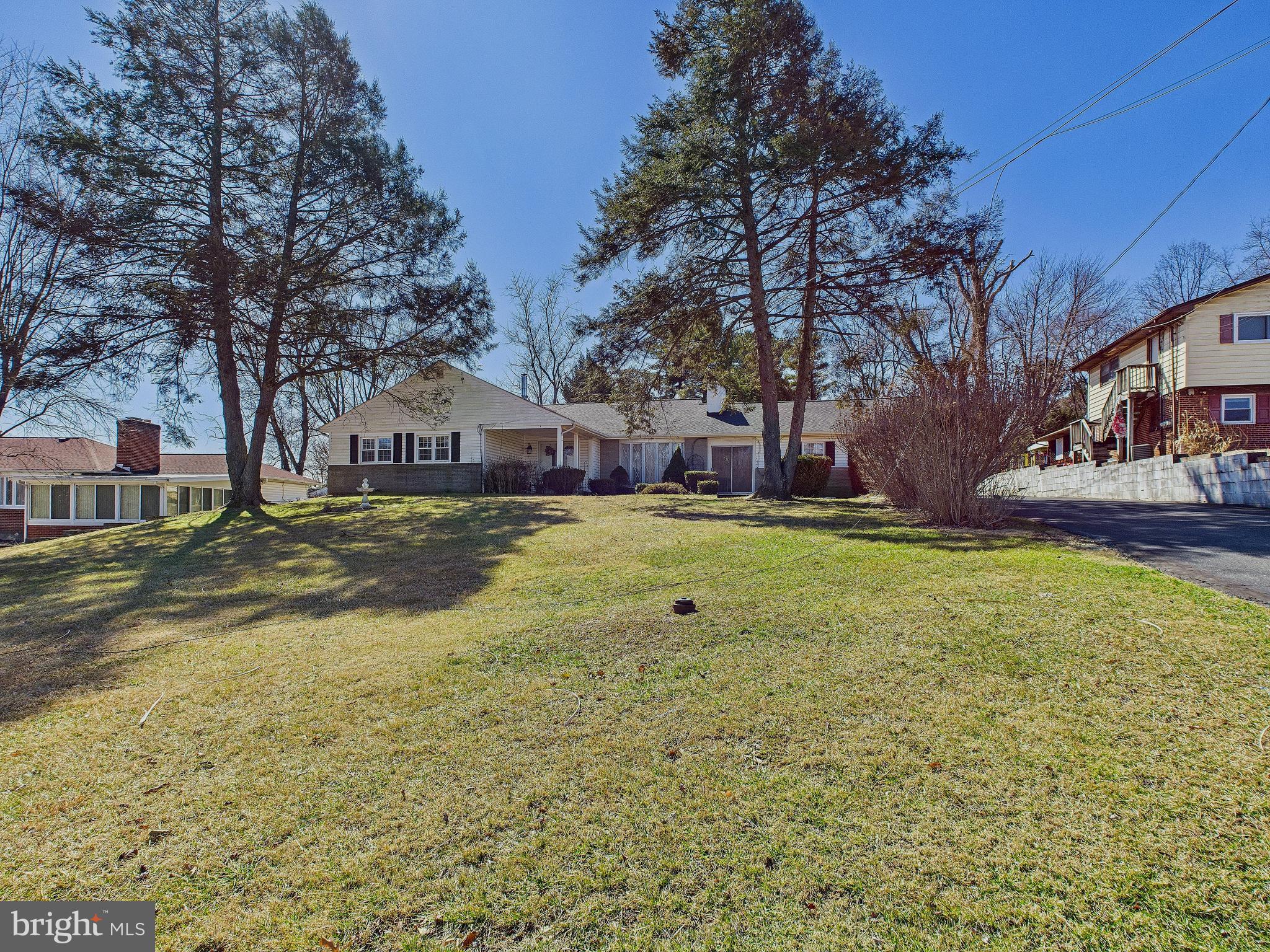 8005 Windsor Mill Road Baltimore, MD 21244 - Photo 2 of 39 a view of yard with swimming pool and green space