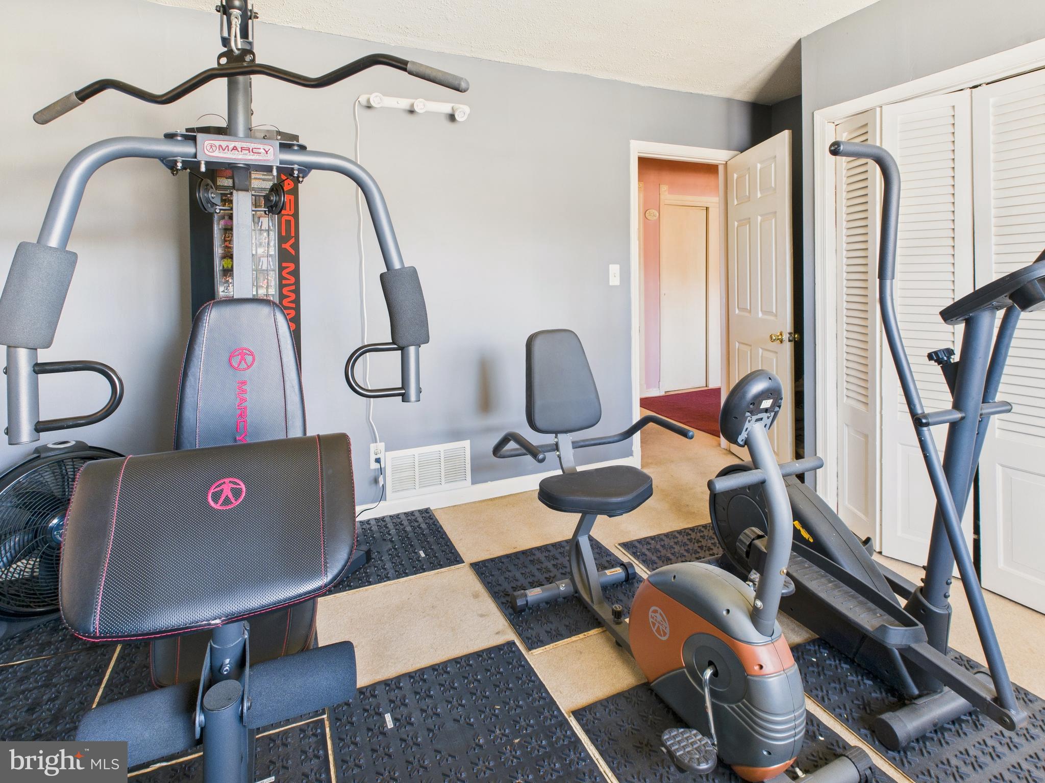 8005 Windsor Mill Road Baltimore, MD 21244 - Photo 26 of 39 a view of a workspace with furniture and a window