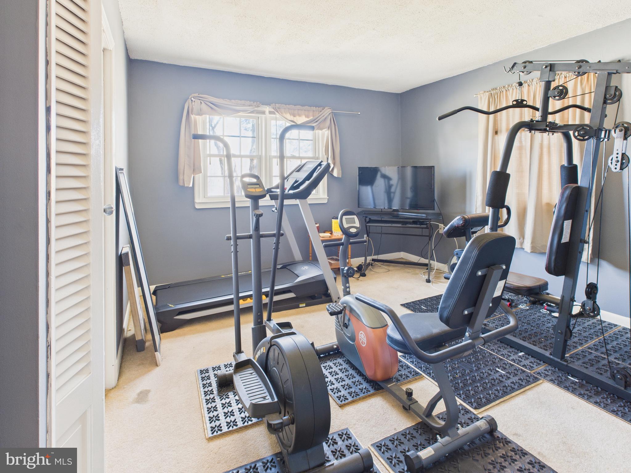 8005 Windsor Mill Road Baltimore, MD 21244 - Photo 27 of 39 a view of a livingroom with furniture and a window