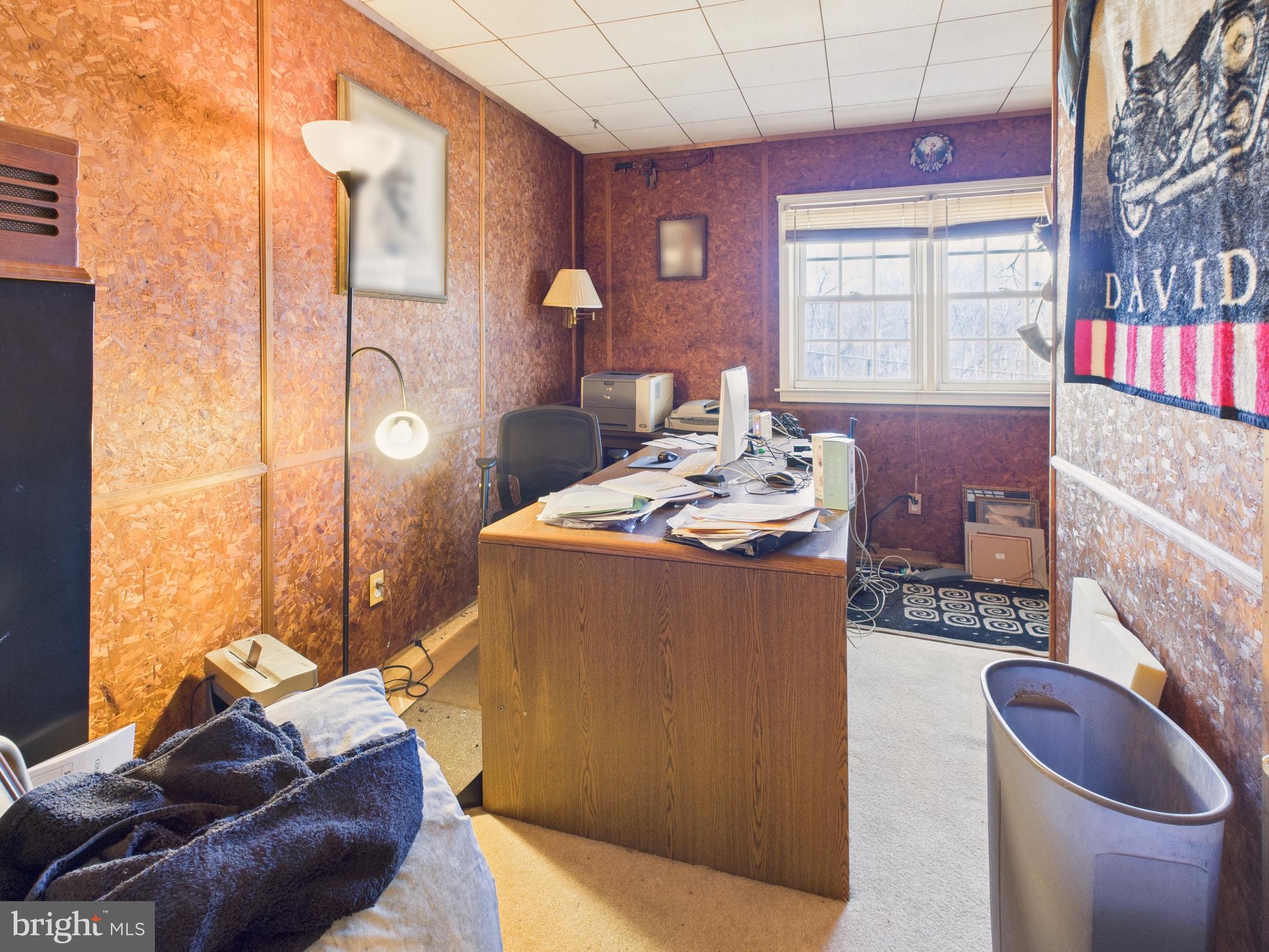 8005 Windsor Mill Road Baltimore, MD 21244 - Photo 28 of 39 a living room with furniture and a fireplace