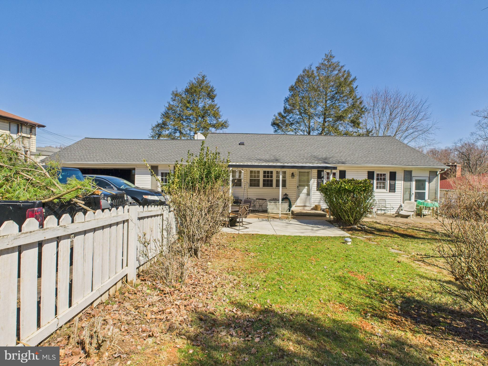 8005 Windsor Mill Road Baltimore, MD 21244 - Photo 32 of 39 a view of a house with backyard and sitting area