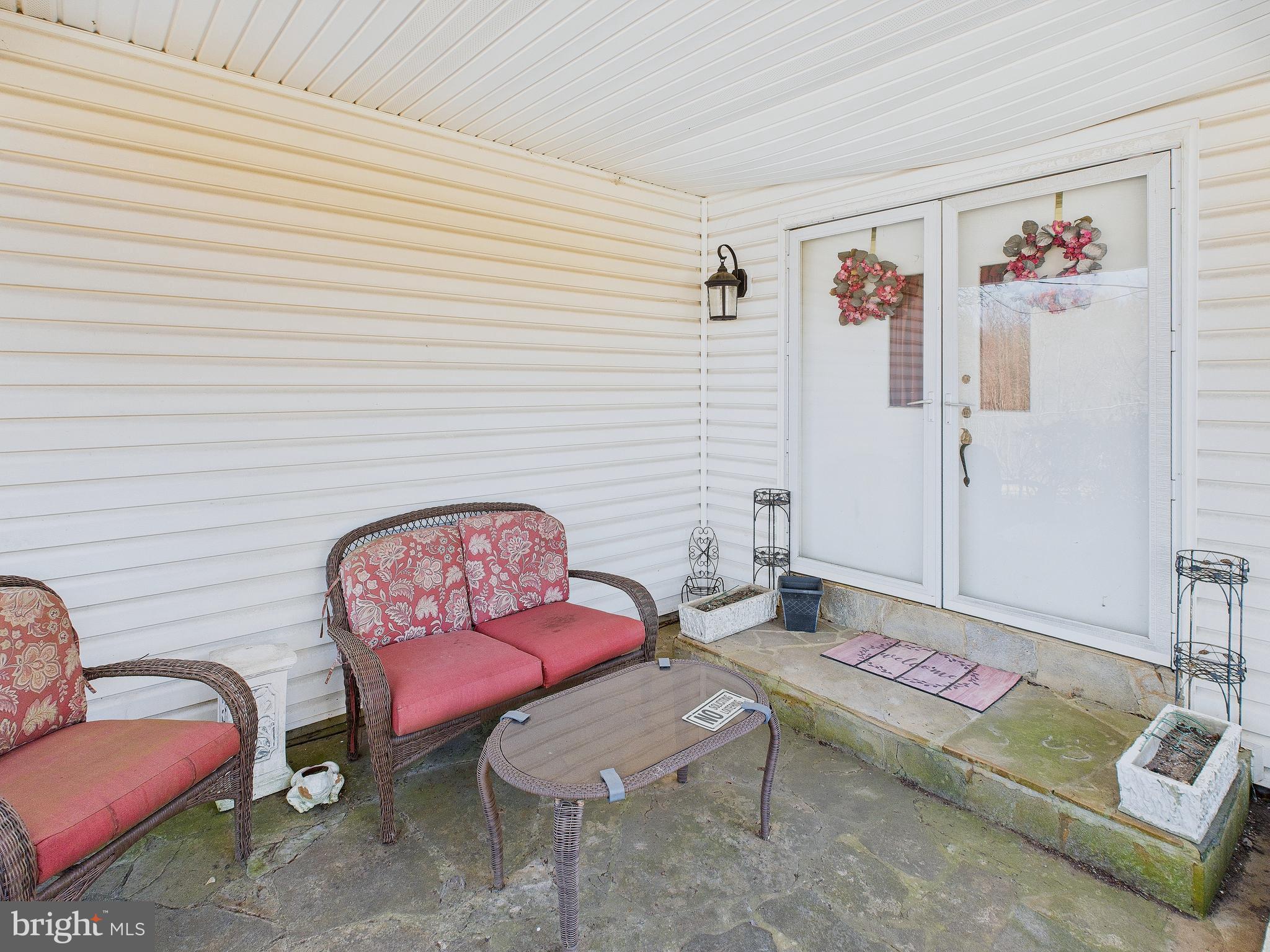 8005 Windsor Mill Road Baltimore, MD 21244 - Photo 6 of 39 a living room with furniture