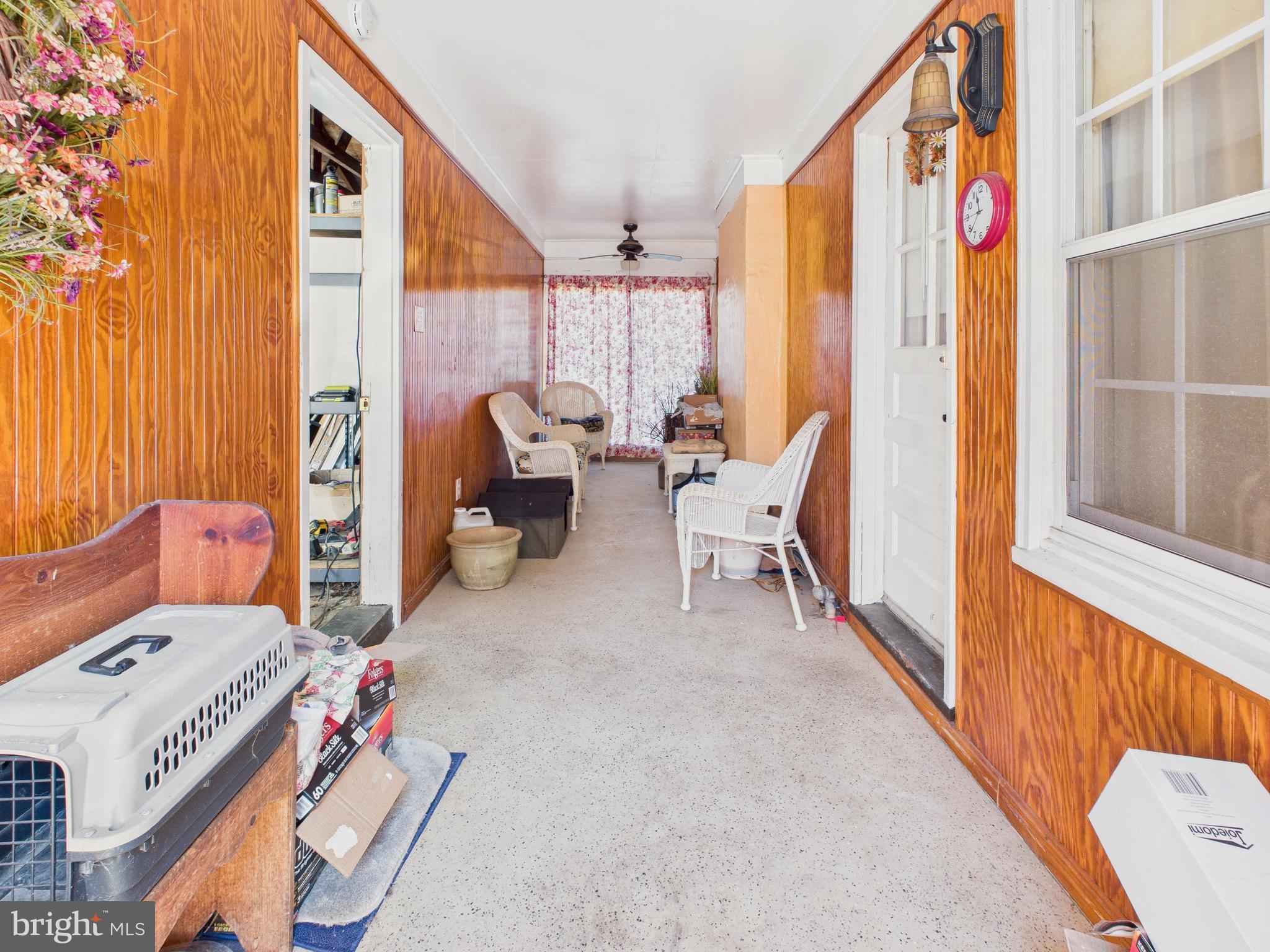8005 Windsor Mill Road Baltimore, MD 21244 - Photo 8 of 39 a living room with furniture and a window