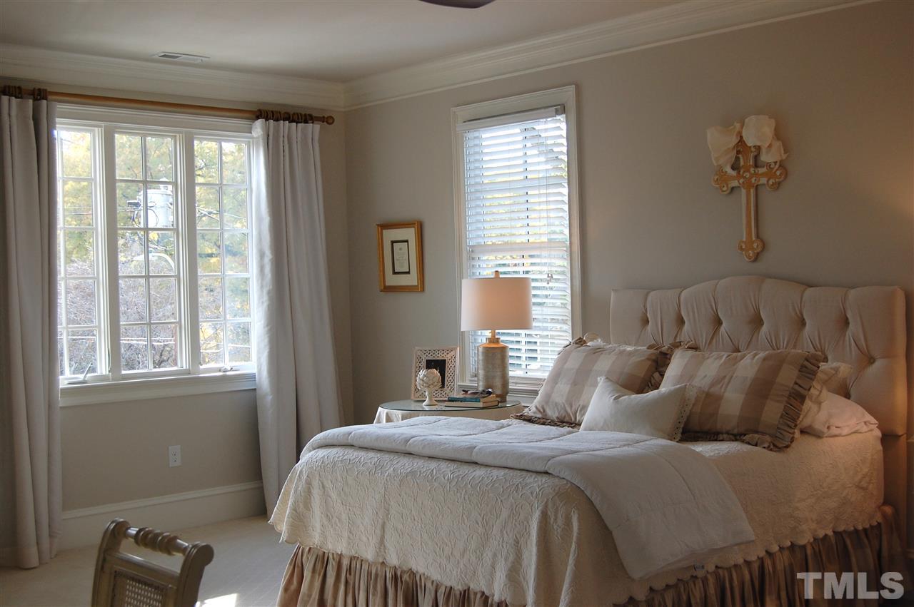 2620 Davis Street Raleigh, NC 27608 - Photo 17 of 28 Master Bedroom with beautiful and airy light from windows.
