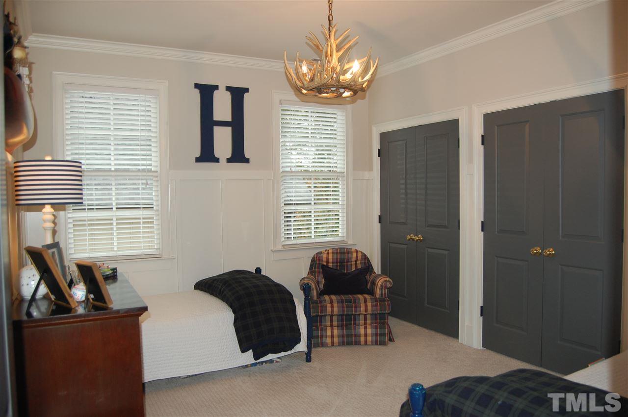 2620 Davis Street Raleigh, NC 27608 - Photo 22 of 28 Custom board & batten molding showcased in this bedroom.
