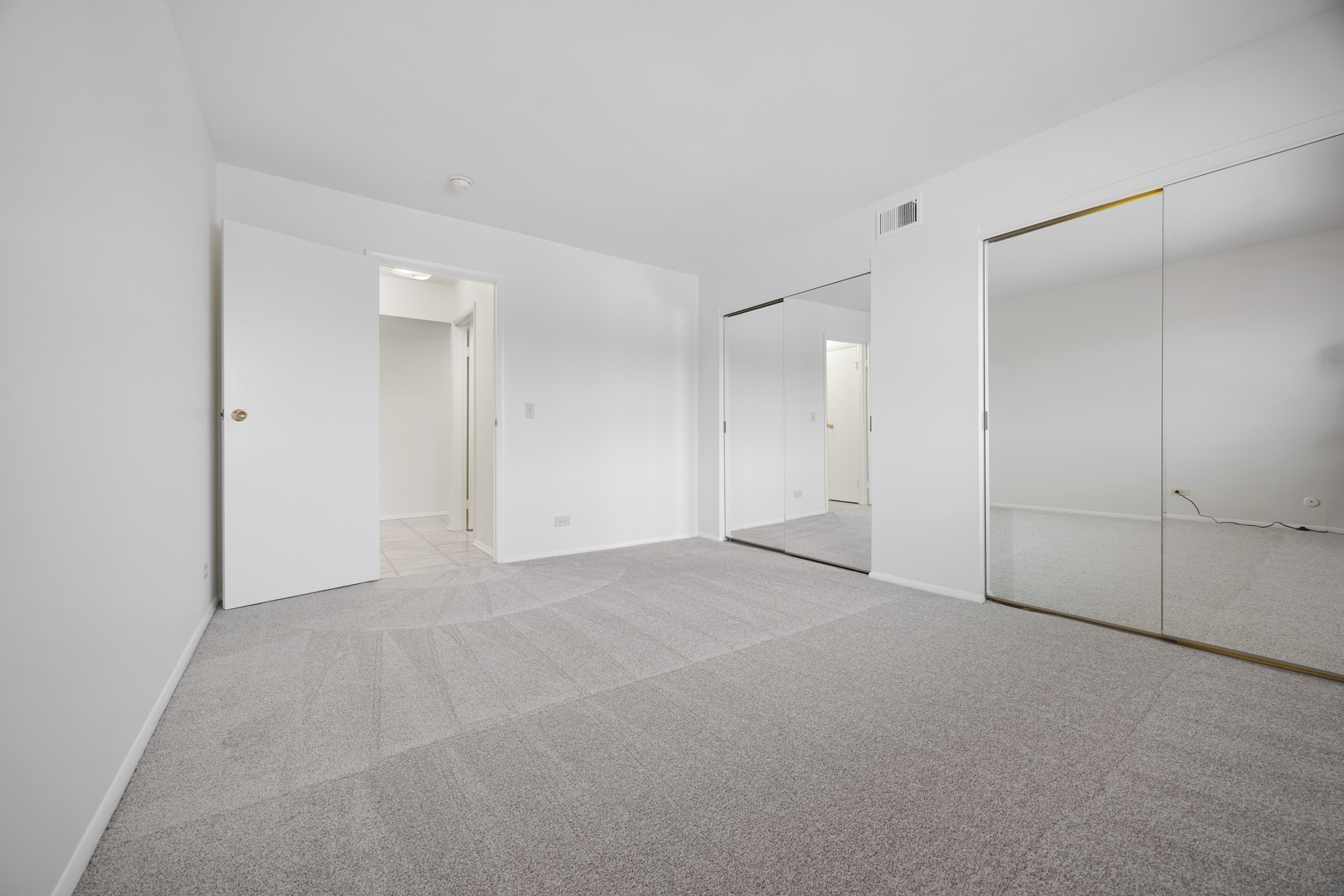 1724 Fayette Walk, Unit J Hoffman Estates, IL 60169 - Photo 12 of 15 a view of an empty room